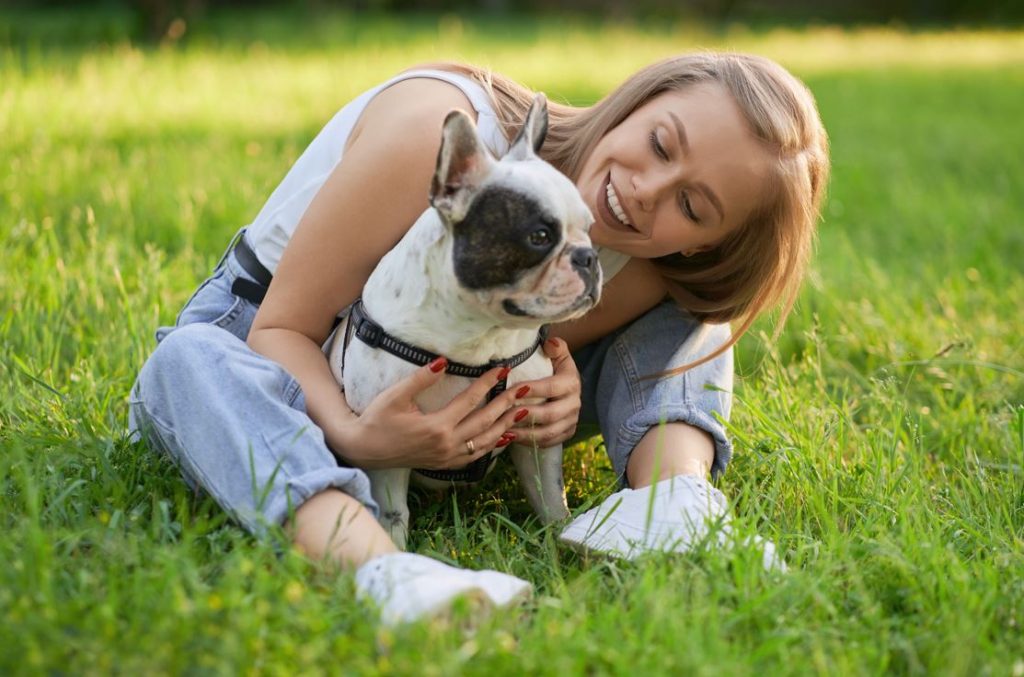 woman-hugging-french-bulldog